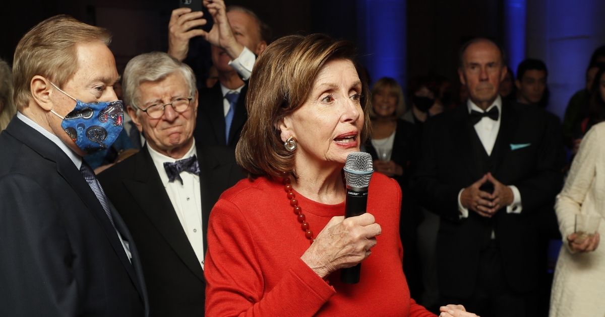 House Speaker Nancy Pelosi, pictured without a mask at a Wednesday event at the National Archives.