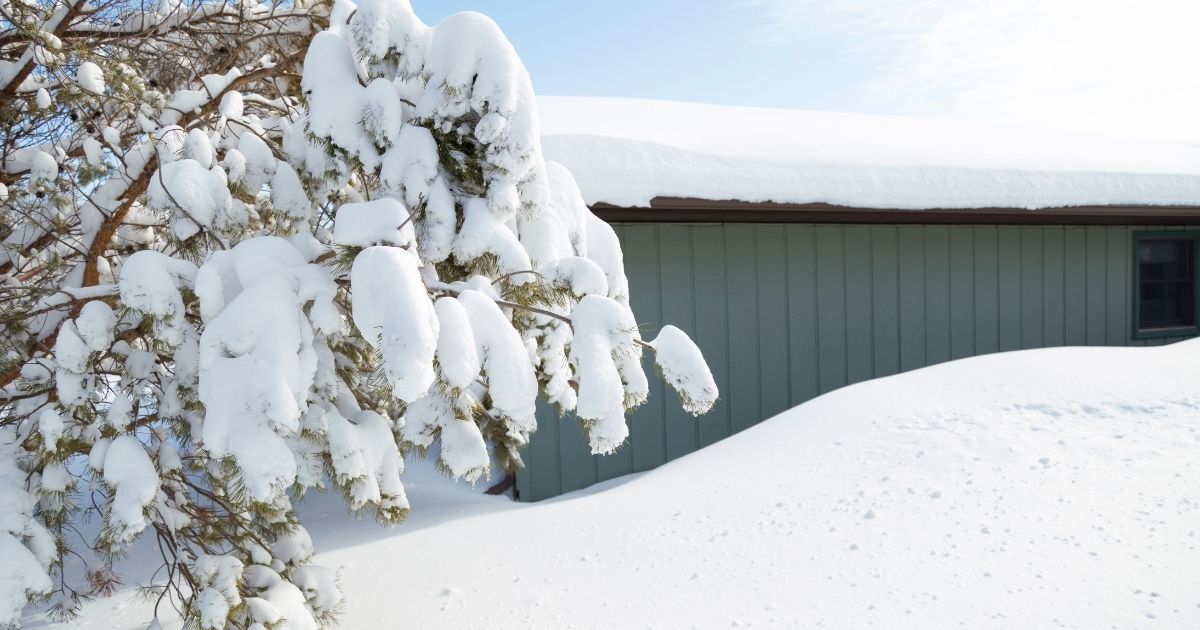 Deep snow covers a property in this stock photo. In 2017, a family in Willmar, Minnesota, got a warm surprise during the heart of winter.