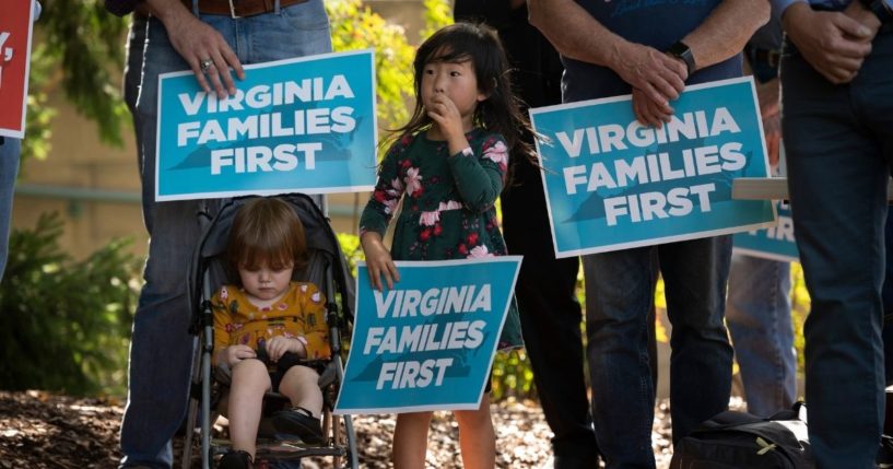 A family participates in a rally sponsored by Catholic Vote and Fight for Schools in Leesburg, Virginia, on Oct. 2, 2021.