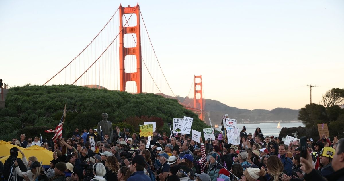 Protesters gather for an anti-vaccine mandate rally at the Golden Gate Bridge on Thursday in San Francisco.