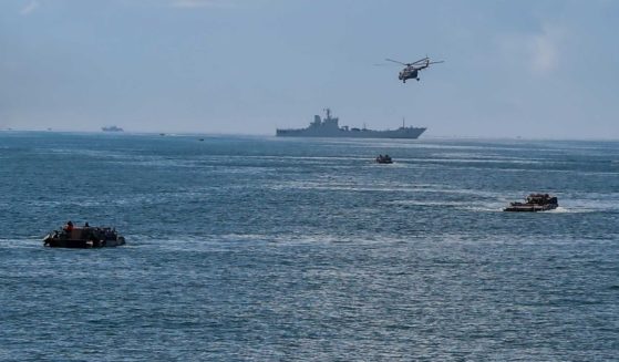 The military helicopters and amphibious assault vehicles attached to a brigade of the army under the PLA Eastern Theater Command conduct coordination in a maritime training exercise on Sept. 4.