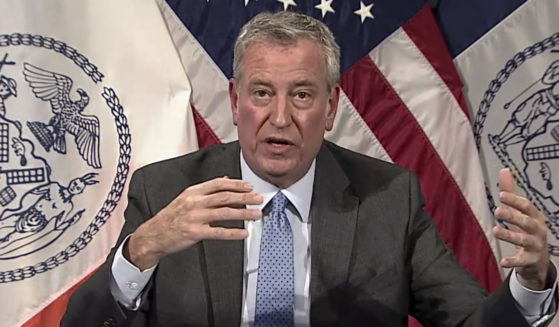 In an image taken from video, New York Mayor Bill de Blasio speaks during a virtual news conference Thursday in New York.