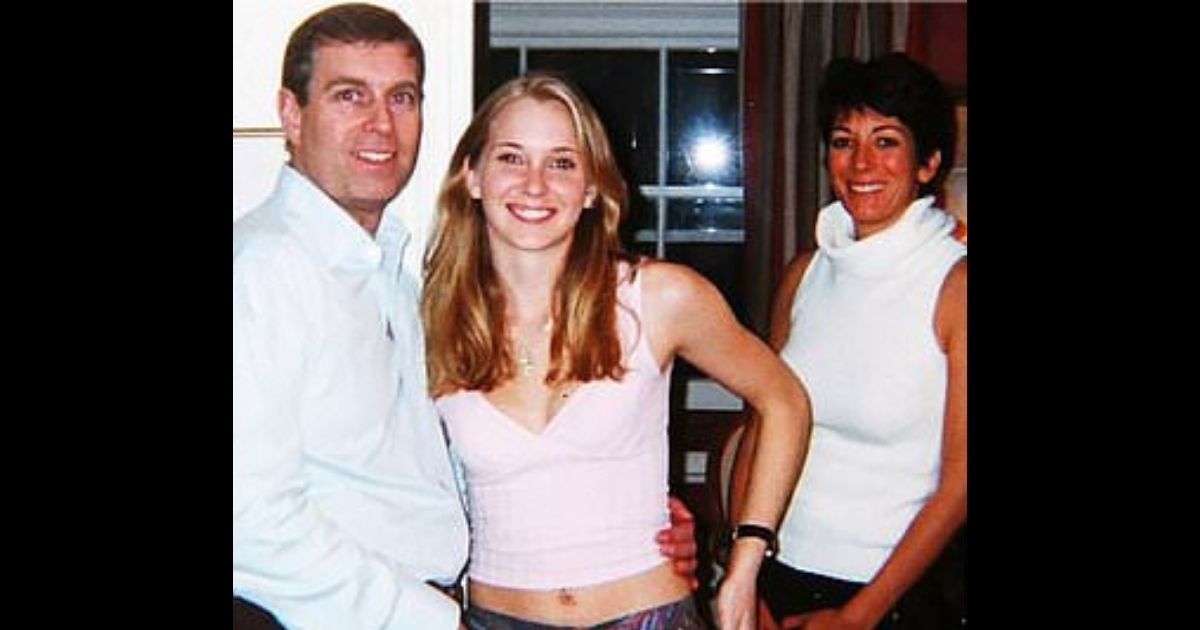 Britain's Prince Andrew poses with his arm around the waist of Virginia Giuffre while Ghislaine Maxwell looks on.