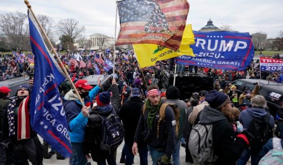 Protesters supporting former President Donald Trump swarm the Capitol on Jan. 6 in Washington, D.C.