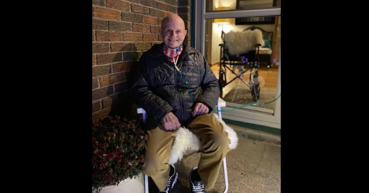 Community members came together to help Dale Marks of Des Moines, Iowa, decorate his house in a Christmas tradition.