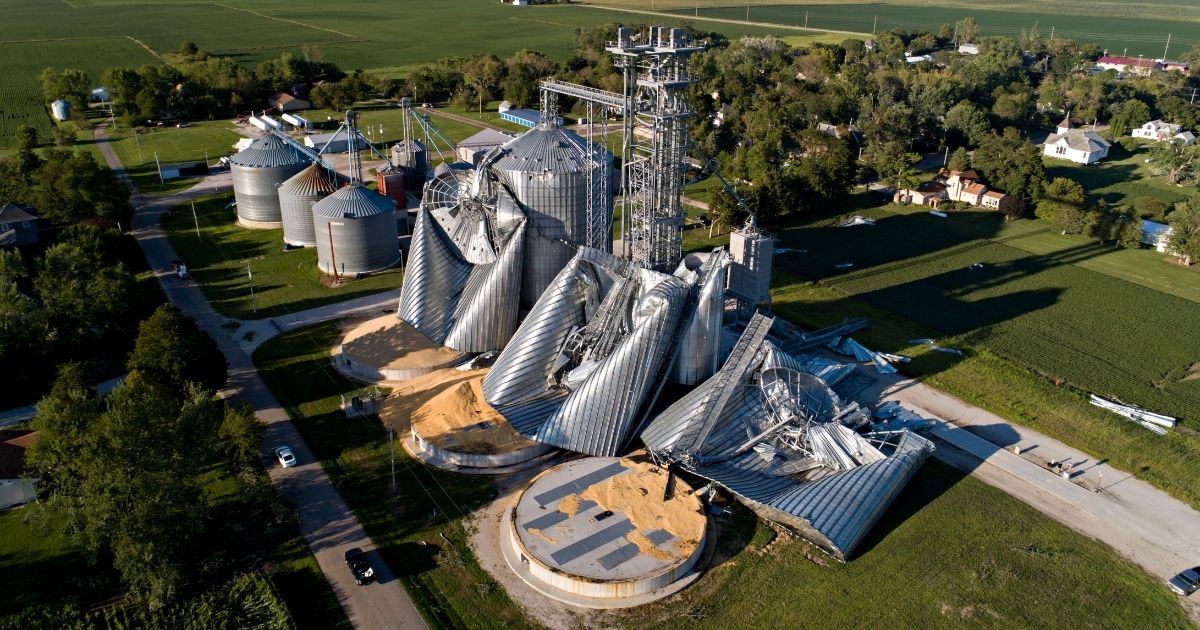 In this aerial image from a drone, damaged grain bins are shown at the Heartland Co-Op grain elevator on Aug. 11, 2020, in Luther, Iowa.