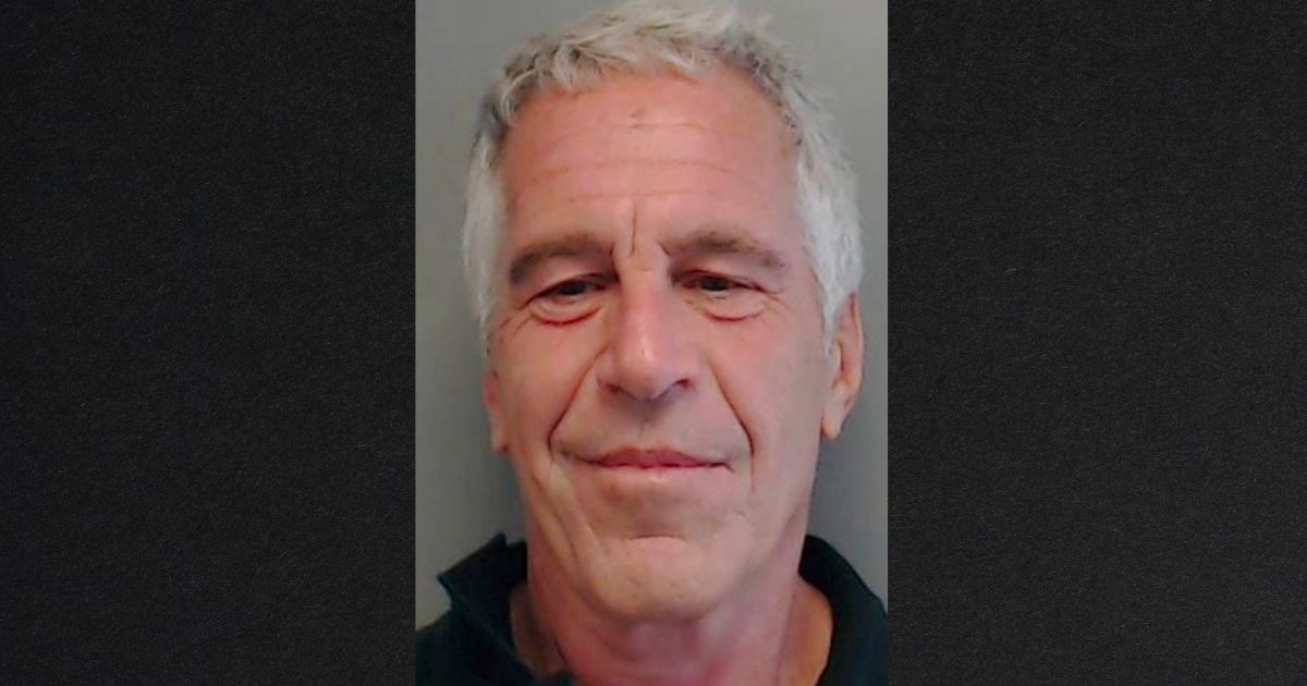 Jeffrey Epstein is seen in an image from July 2013 provided by the Florida Department of Law Enforcement. Charges have been dropped against two prison guards who admitted they were not watching the night Epstein allegedly killed himself.