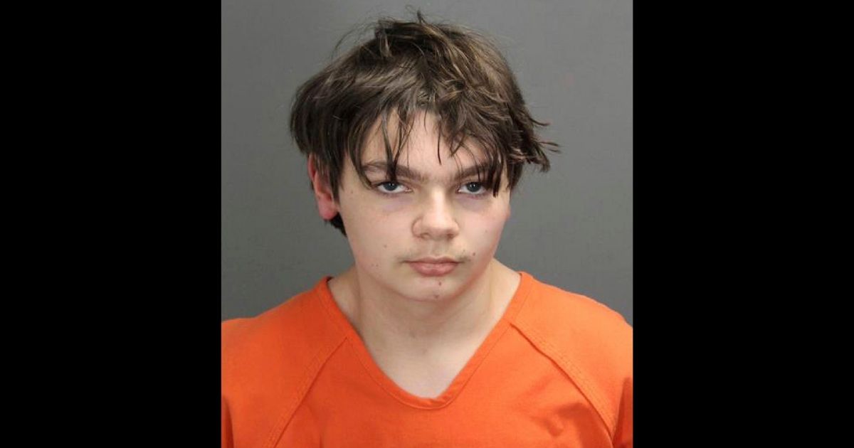 This booking photo released by the Oakland County, Michigan, Sheriff's Office shows Ethan Crumbley, 15, who is charged as an adult with murder and terrorism for a shooting that killed four fellow students and injured more at Oxford High School in Oxford, Michigan, authorities said on Dec. 1.