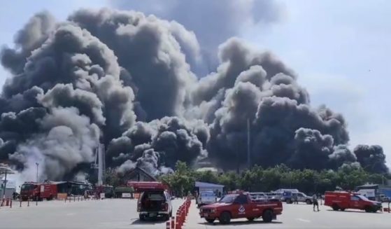 A disgruntled employee allegedly set a piece of paper on fire and threw it into a fuel container at the Prapakorn Oil warehouse in Thailand's Nakhon Pathom province Nov. 29. The subsequent explosion and fire required 40 fire engines to extinguish.