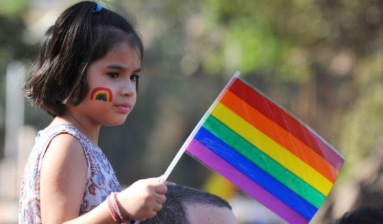A girl looks on during the "Queer Azadi March" freedom march for LGBT supporters, in Mumbai on Jan. 29, 2011.