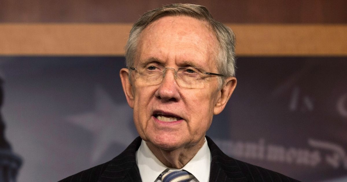 Then-Senate Majority Leader Harry Reid of Nevada speaks during a news conference at the Capitol in Washington on Oct. 16, 2013.
