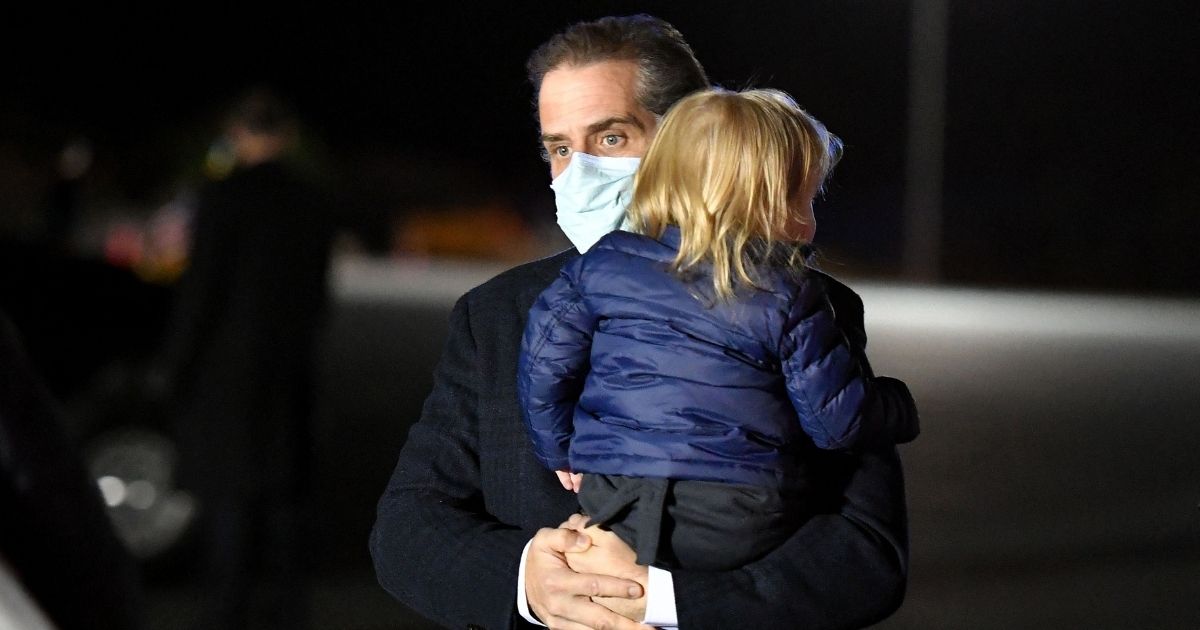 Hunter Biden is seen on the tarmac after stepping off Air Force One upon arrival at Nantucket Memorial Airport in Nantucket, Massachusetts, on Nov. 23.
