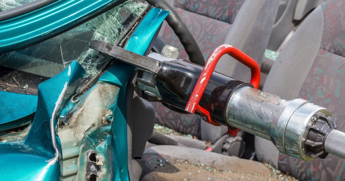 This stock image shows the "jaws of life" tool being used to cut apart a car. One unidentified woman in Warren County, Ohio, had several difficulties after choosing to help a stranger in a car crash.