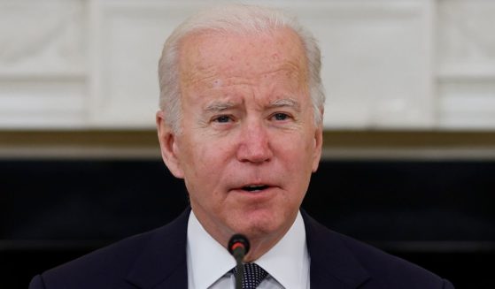 President Joe Biden speaks in the State Dining Room of the White House in Washington on Thursday.