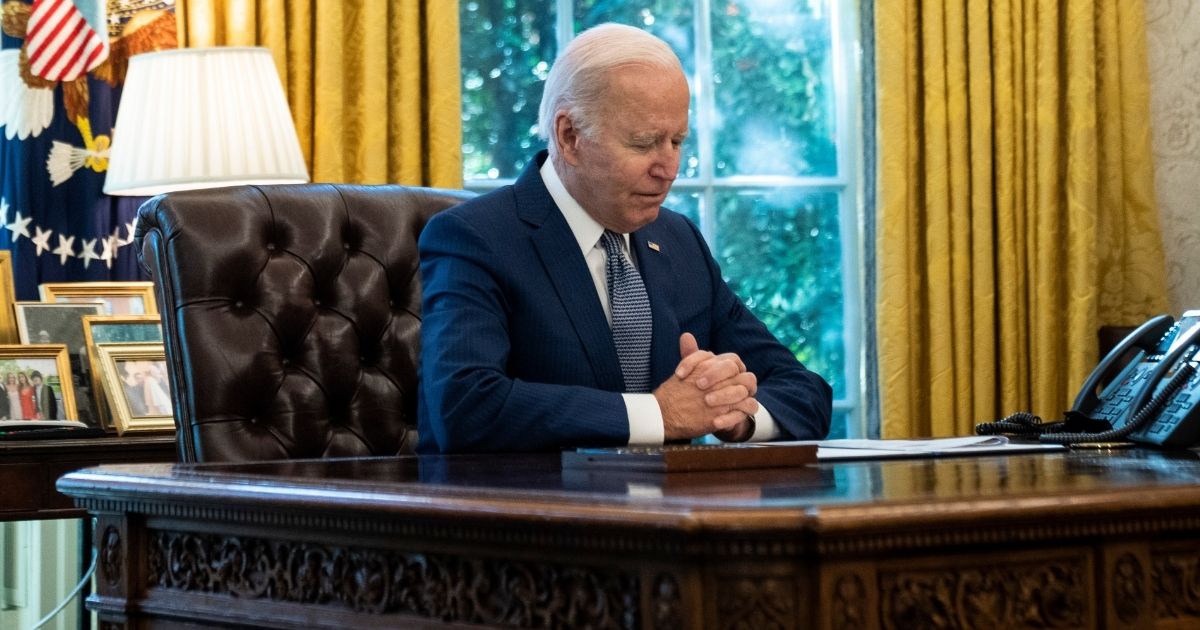 President Joe Biden speaks before signing an executive order related to government services in the Oval Office of the White House on Dec. 13 in Washington, D.C.