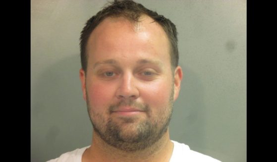 In this handout photo provided by the Washington County Sheriff’s Office, former television personality on "19 Kids And Counting" Josh Duggar poses for a booking photo after his arrest on April 29 in Fayetteville, Arkansas.