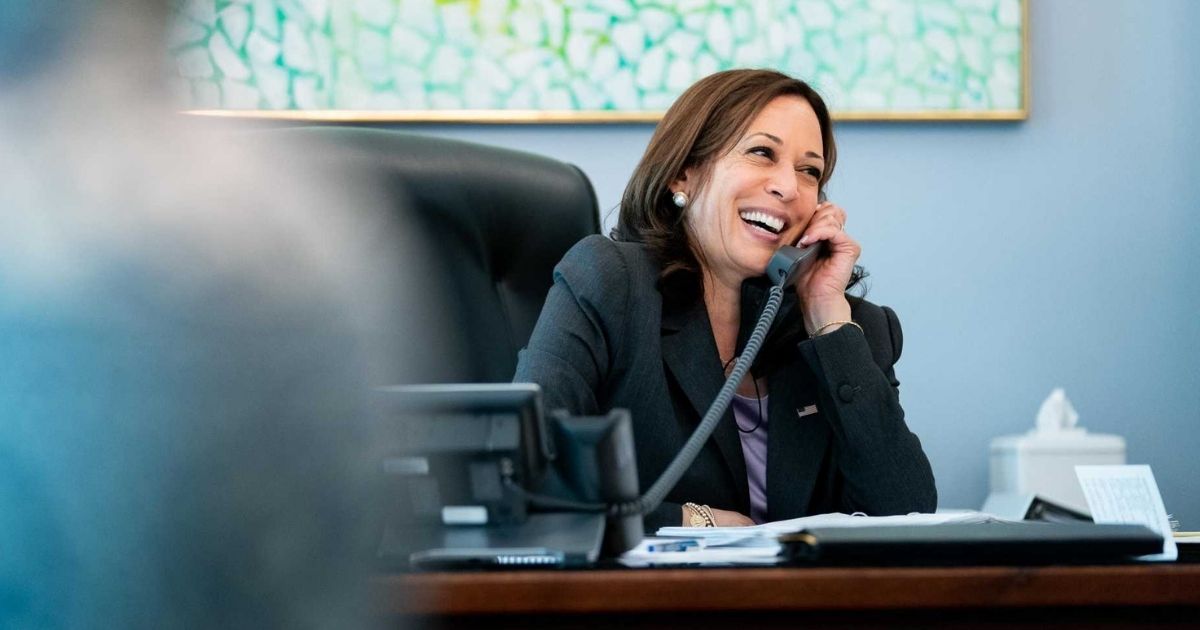 Vice President Kamala Harris talks on the phone in her newly redecorated office.