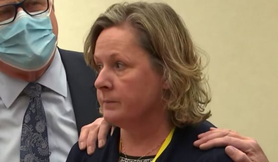 In a screen grab from video, former Brooklyn Center police officer Kim Potter stands with defense attorney Earl Gray as the verdict is read at the Hennepin County Courthouse in Minneapolis on Dec. 23.