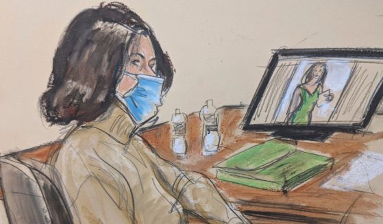 In this courtroom sketch, Ghislaine Maxwell is seated at the defense table while watching testimony of witnesses during her trial on Tuesday in New York.