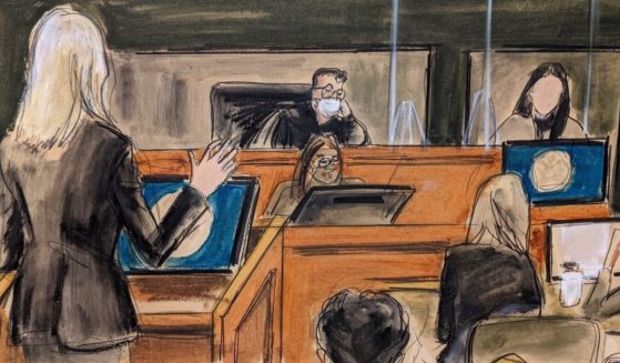 A courtroom sketch shows Ghislaine Maxwell's defense attorney Laura Menninger, left, cross-examining a witness using the pseudonym "Jane" during this week's trial in New York. The woman testified that she had repeated sexual contact with disgraced financier Jeffrey Epstein when she 14 and that Maxwell was there when it happened.