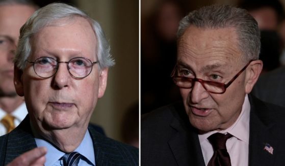 Senate Minority Leader Mitch McConnell of Kentucky, left, and Senate Majority Leader Chuck Schumer of New York speak at a news conference Dec. 7 in Washington, DC. McConnell on Tuesday agreed to vote to lift the debt ceiling by $2.5 trillion.