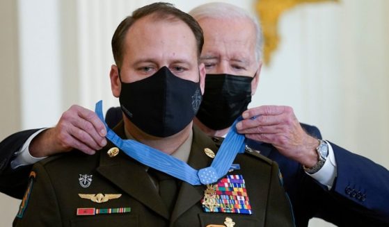 President Joe Biden presents the Medal of Honor Thursday to Army Master Sgt. Earl Plumlee for his actions in Afghanistan on Aug. 28, 2013.