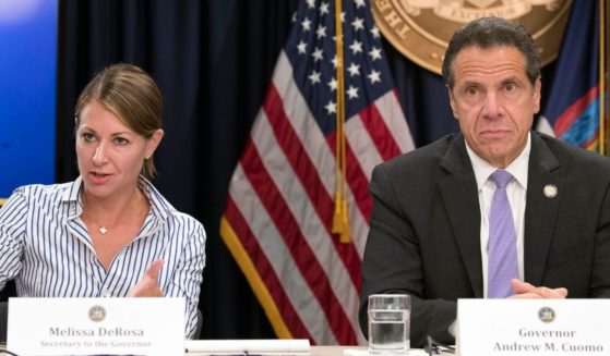 Then Secretary to the Governor Melissa DeRosa, left, and then New York Gov. Andrew Cuomo sir together for a press conference in New York on Sept. 14, 2018.