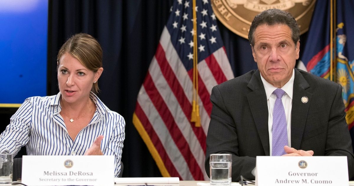 Then Secretary to the Governor Melissa DeRosa, left, and then New York Gov. Andrew Cuomo sir together for a press conference in New York on Sept. 14, 2018.