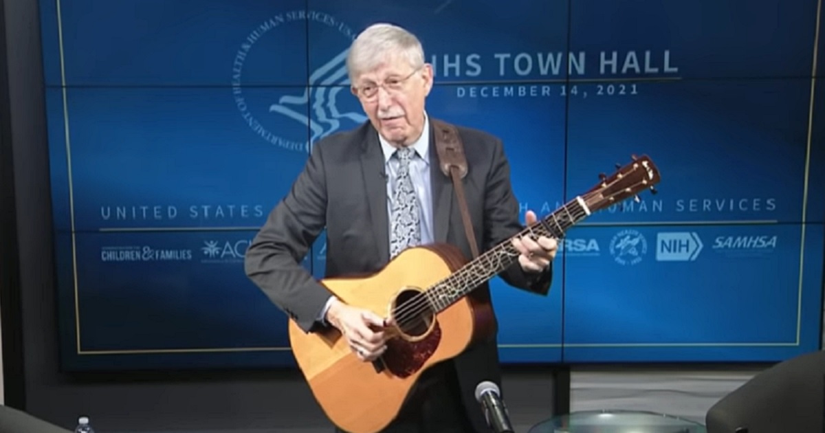 Outgoing National Institutes of Health Director Dr. Francis Collins strums a guitar while singing a pandemic-themed parody of "Somewhere Over the Rainbow."