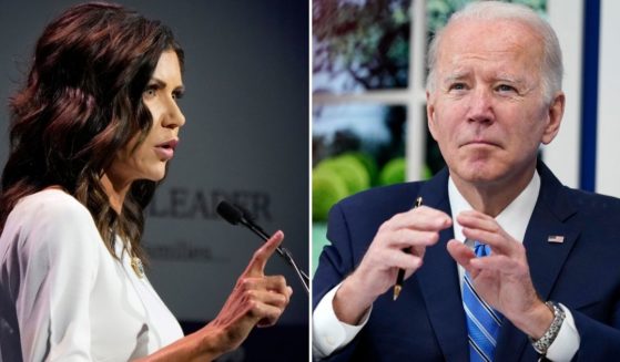 South Dakota Gov. Kristi Noem, left, responded to President Joe Biden's comment that "there is no federal solution" to the coronavirus crisis by calling on Biden to withdraw his controversial federal vaccine mandates.