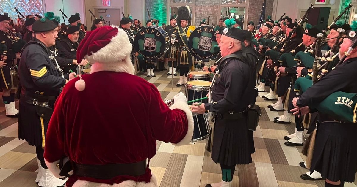Santa Claus and the NYPD Emerald Society Pipes and Drums band were on hand at the party for the families of fallen officers.