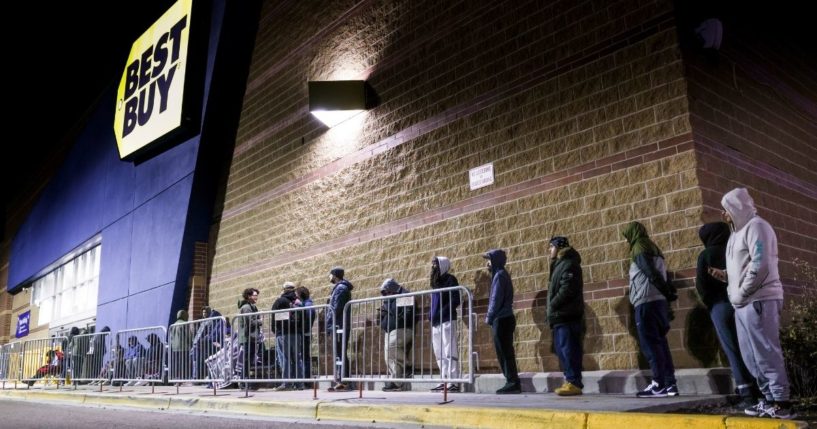 Black Friday shoppers wait in line for Best Buy to open on Friday in Westminster, Colorado.