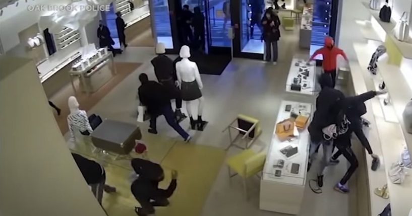 "Smash and grab" robbers clear the shelves of a high-end store in Los Angeles.