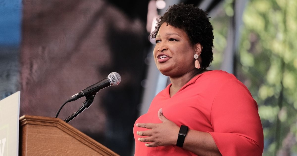 Failed gubernatorial candidate Stacey Abrams speaks during a get-out-the-vote rally for Democratic gubernatorial candidate former Virginia Gov. Terry McAuliffe at Ting Pavilion on Oct. 24 in Charlottesville, Virginia.