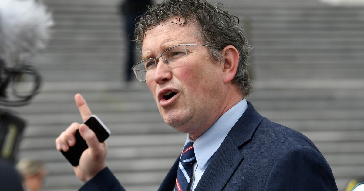 GOP Kentucky Rep. Thomas Massie speaks to a group of reporters on Capital Hill in Washington, D.C., on Mar. 27, 2020.