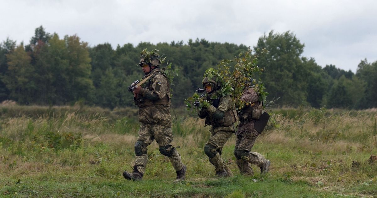 Ukrainian servicemen take part in military exercises with the U.S. and other NATO countries not far from Lviv, Ukraine, on Sept. 24.