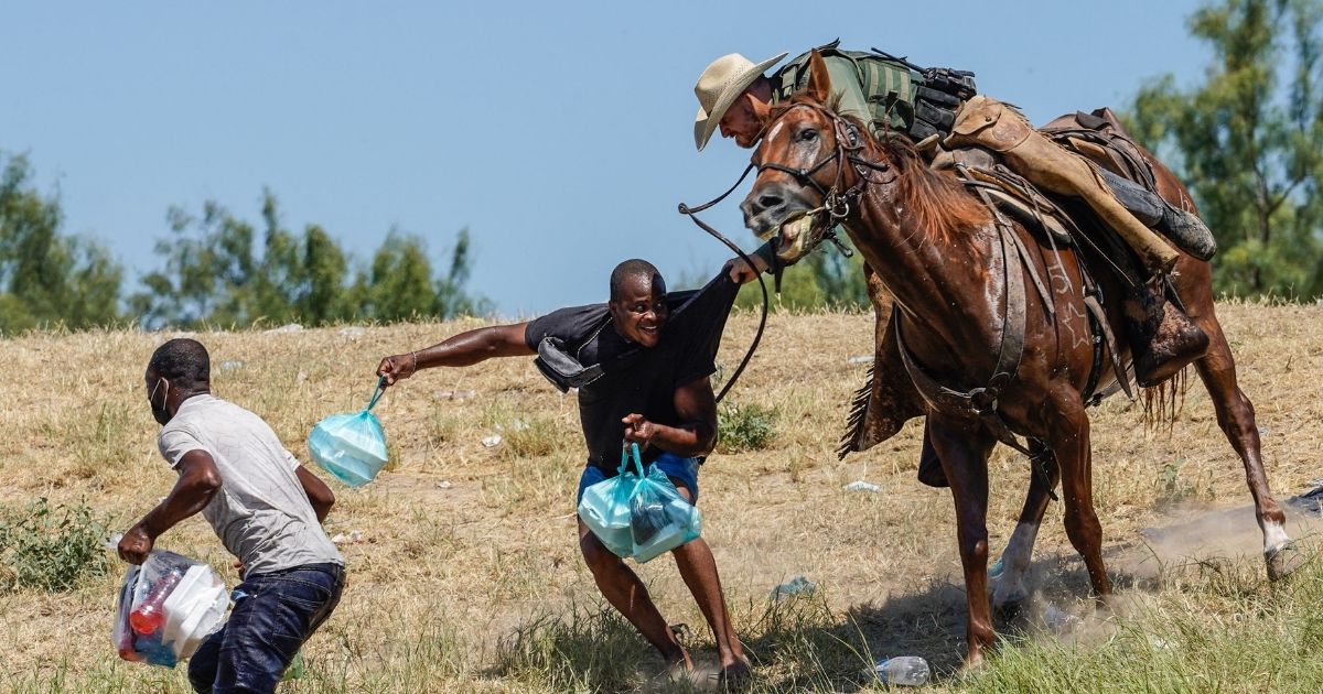 On Sept. 19, a Border Patrol agent used his horse to stop a Haitian illegal immigrant after he crossed over the Rio Grande near Del Rio, Texas.
