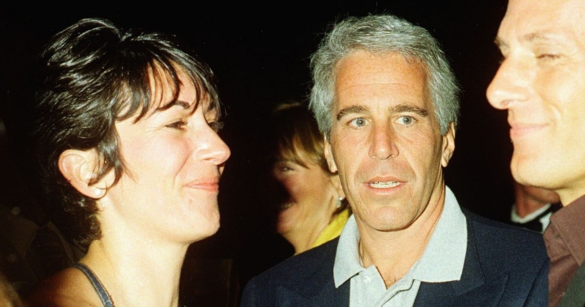 Ghislaine Maxwell and the now-deceased Jeffrey Epstein are pictured in file photo from February 2000 at the Mar-a-Lago club, Palm Beach, Florida.