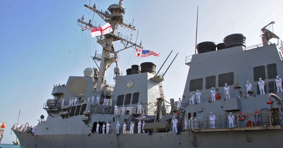 The USS Winston S. Churchill, a Navy guided-missile destroyer, anchors in Port Sudan, Sudan, on March 1.