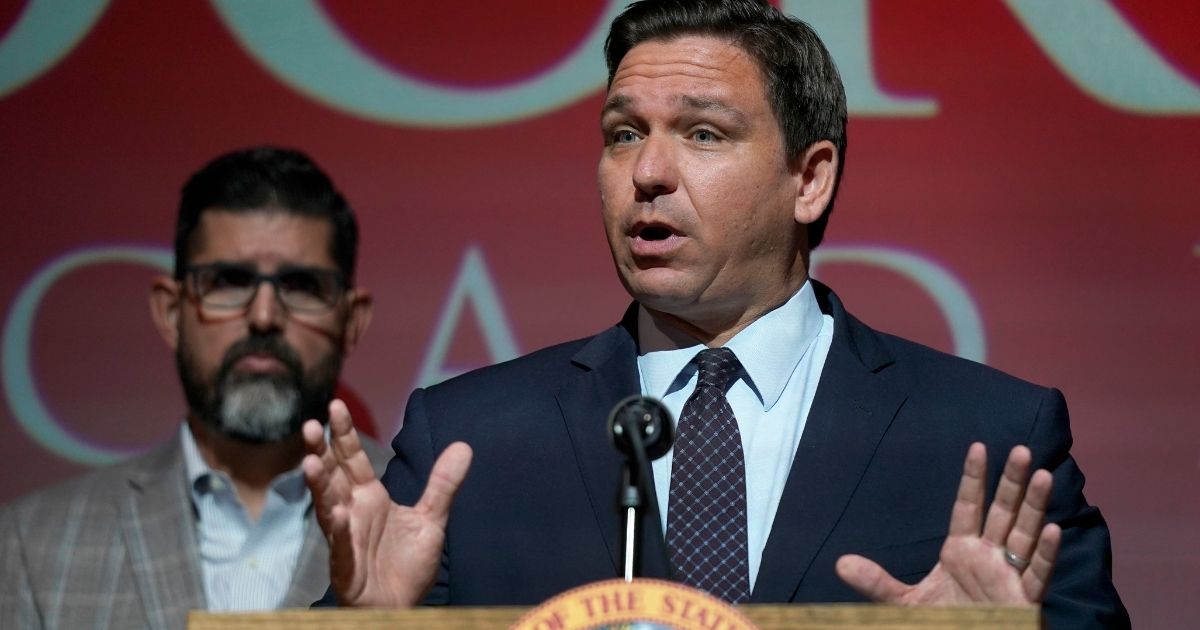 Florida Gov. Ron DeSantis speaks in Doral on Sept. 14, 2021, two weeks before he announced a lawsuit against the Biden administration, claiming its immigration policy is illegal.