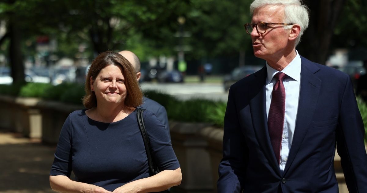 Washington Post Publisher Fred Ryan and Executive Editor Sally Buzbee walk in the nation's capital on June 14, 2021.