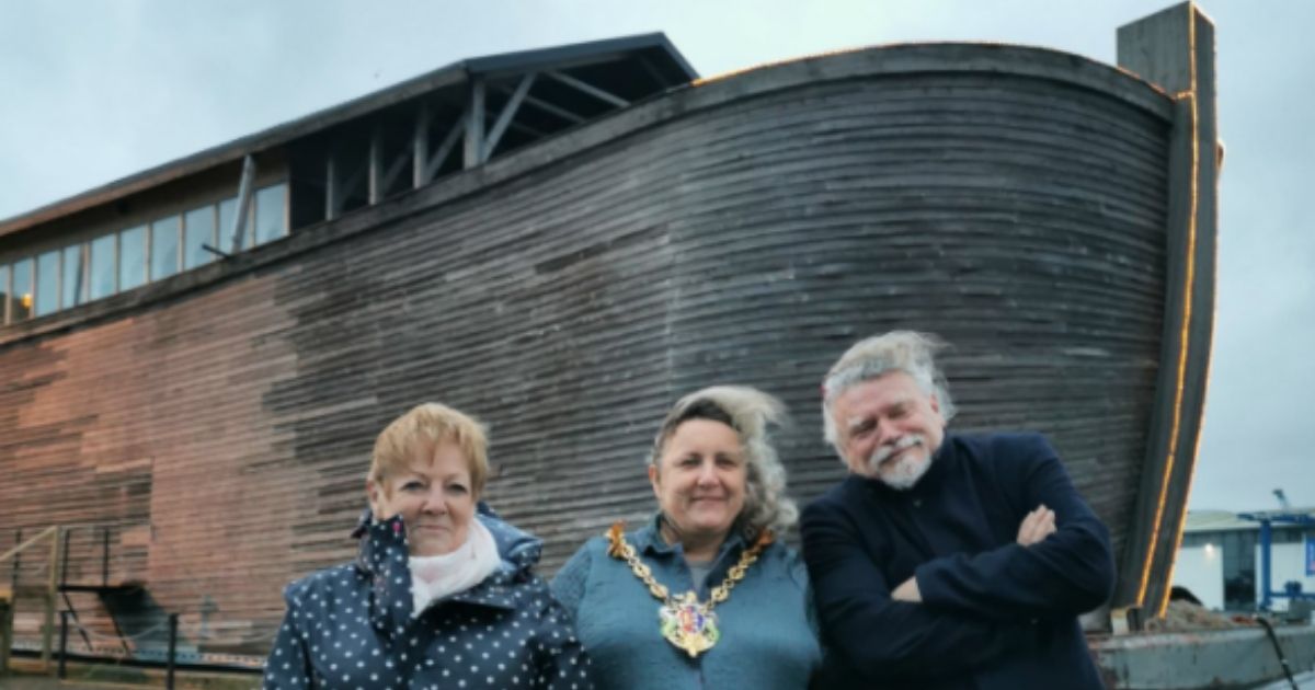 With biblical enthusiasts in the foreground, a half-sized replica of Noah’s Ark sits docked in Ipswich, England, in February 2020.
