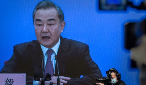 Wang Yi, China's foreign minister, answers a question during a video news conference in Beijing on March 7, 2021.