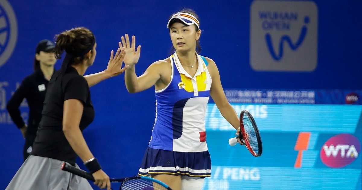 Sania Mirza of India and Shuai Peng of China celebrate a point during the ladies doubles semifinal of the Wuhan Open in Wuhan, China, on Sept. 29, 2017.