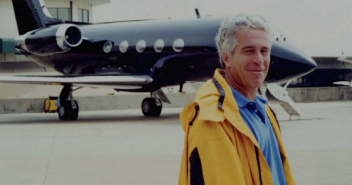 The late financier Jeffrey Epstein stands in front of the Boeing jet nicknamed the "The Lolita Express."