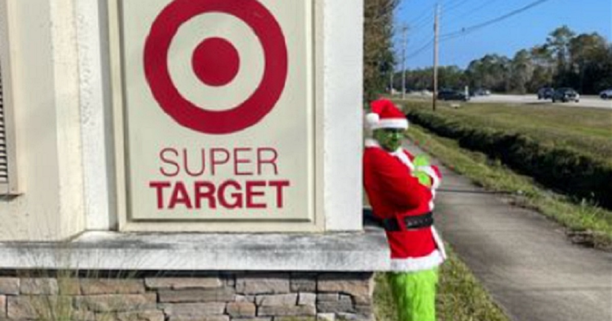 A "Grinch" stands next to a Target Superstore sign in a Facebook post by the Flagler County, Florida, Sheriff's Office.