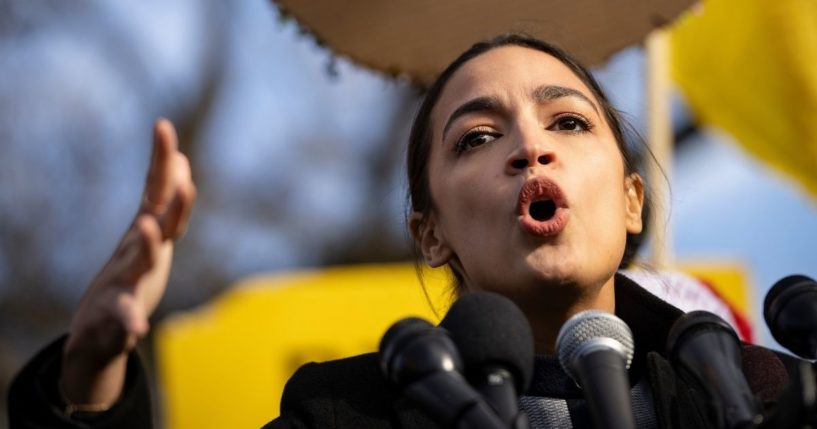 Rep. Alexandria Ocasio-Cortez speaks during a rally outside the U.S. Capitol on Dec. 7, 2021, in Washington, D.C.