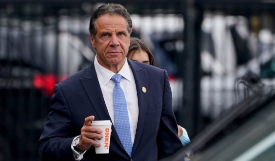New York Gov. Andrew Cuomo prepares to board a helicopter after announcing his resignation on Aug. 10 in New York.