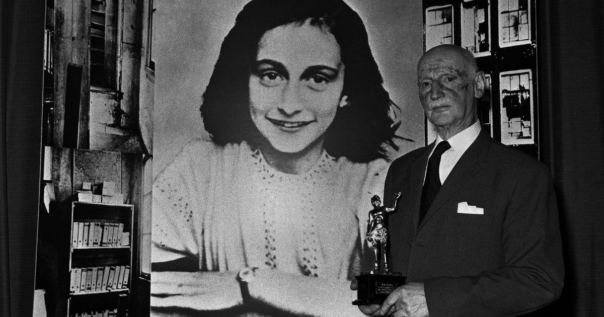 Dr. Otto Frank is seen in this file photo from 1971, holding the Golden Pan award given for the sale of one million copies of the famous paperback, 'The Diary of Anne Frank,' by Frank's daughter. The book told the true story of a Jewish family who went into hiding in 1942 in Amsterdam, where they remained undiscovered for two years. Dr. Frank was the family's only survivor. A team of investigators has revealed this week the name of the person who betrayed the family to the Nazis.