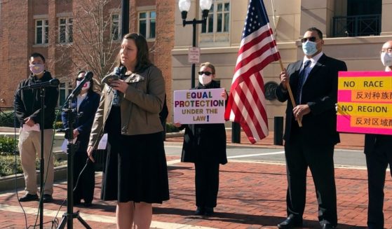 Erin Wilcox of the Pacific Legal Foundation, attorney for the parents' group Coalition for TJ, speaks at a news conference outside a federal courthouse in Virginia in this file photo from March 2021. Her organization filed a lawsuit against Fairfax County's school board, alleging discrimination against Asian Americans with its revised admissions process for the elite Thomas Jefferson High School for Science and Technology.